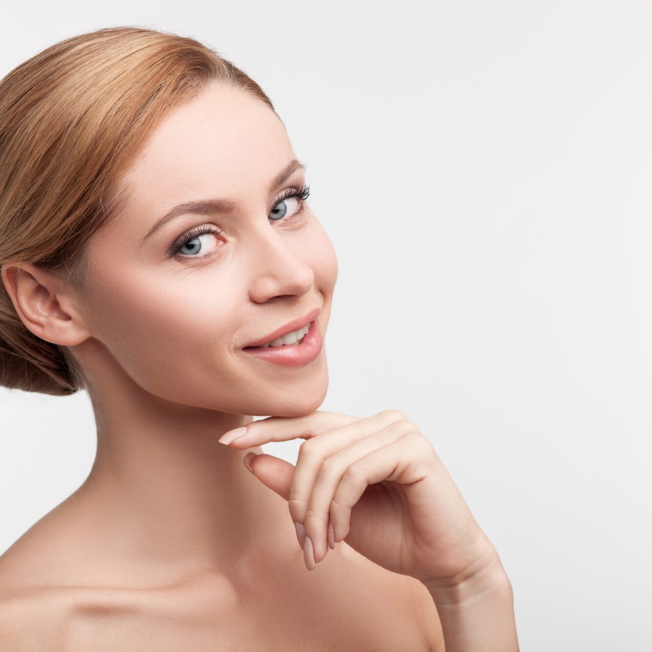 Beautiful healthy blonde woman is posing.
